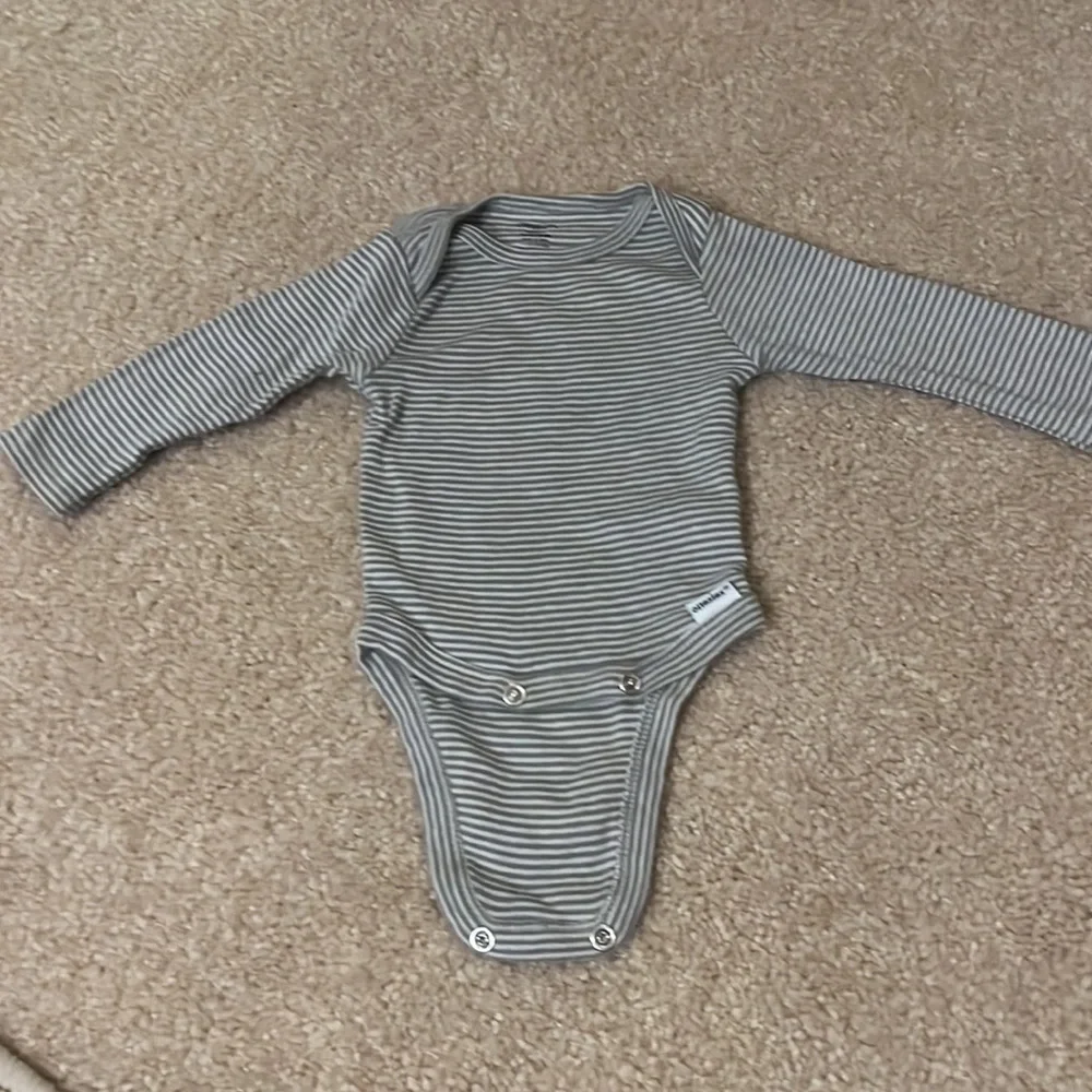 Five NB Animal style Onesies